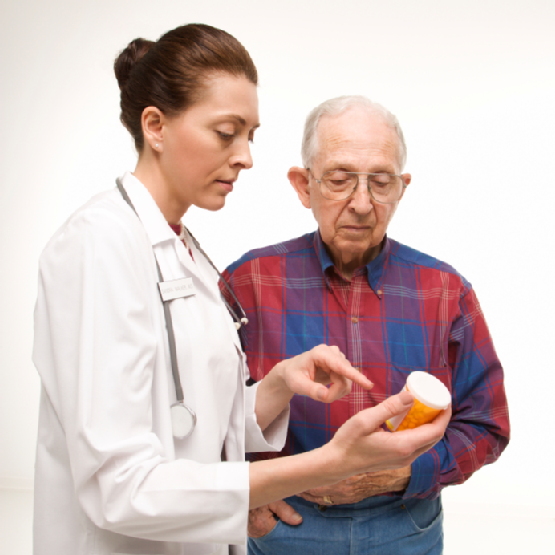 doctor explaing meds to elder