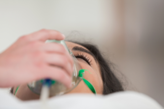 Patient with oxygen mask